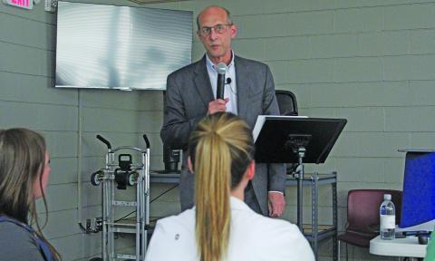 Ron Winters with Gibbons Advisors speaks during a forum in Cashiers.