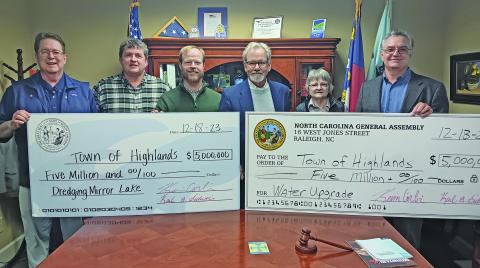 North Carolina Sen. Kevin Corbin (R-Macon) and Rep. Karl Gillespie (R-Macon) delivered a pair of checks for $5 million each to the Town of Highlands last week. The state funds will cover a new clarifier tank at the water treatment plant, and the dredging of Mirror Lake.