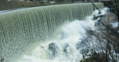 The water over Lake Sequoyah Dam, which was barely a trickle in November during severe drought conditions, was raging following more than four inches of rain in less than 12 hours on Tuesday.