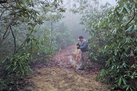 Photo by Nick Childs/staff - Volunteers with the Highlands Cashiers Land Trust worked to upgrade the trail at Brushy Face Preserve in Highlands.