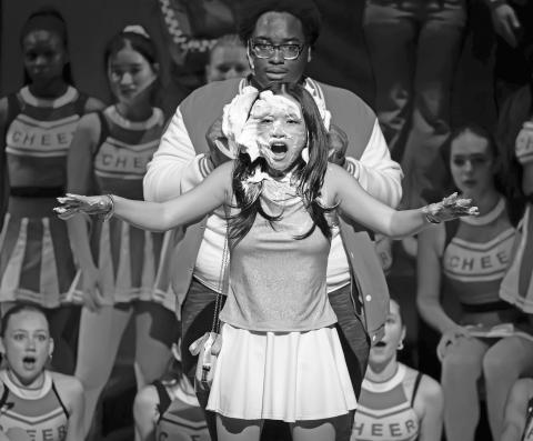 Sharpay, played by Sophia Moore of Highlands, gets a crème brûlée to the face, courtesy of Zeke, played by Uly Kunaiyi-Akpanah of Abuja, Nigeria, in Rabun Gap’s production of “High School Musical.”