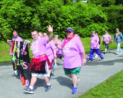 Special Olympics athletes complete the ceremonial walk which kicked off the games at Highlands School.