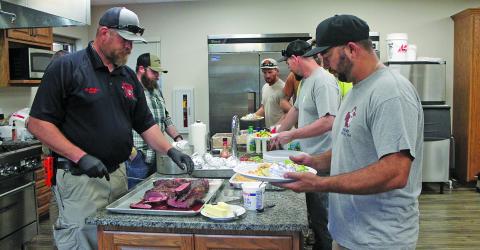 Firefighters at Highlands Fire Department served up dinner for linemen who have been out working to reconnect power since Sept. 28.