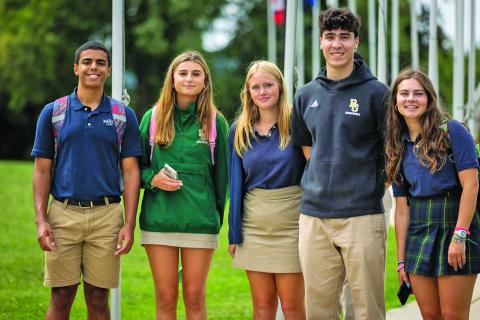 Rabun Gap seniors Jeremiah Griffiths, of Canada, Sonya Tretiakov, of Cashiers, Zuri Renken, of Dillard, Leo Yoshioka, of Brazil, and Katie Barta, of Franklin, on the first day of class.