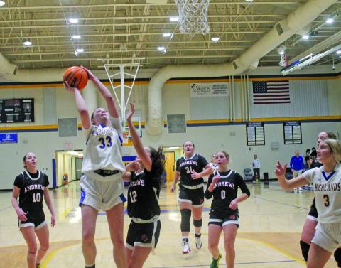 Highlands’ Hunter Conner (33) goes up for a shot as Charlotte Westendorf (3) gets in position to rebound against Andrews on Wednesday night. 