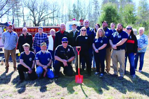 Otto Volunteer Fire and Rescue members, past and present, celebrate the start of construction of a new firehouse at 8249 Georgia Road, on Monday, Feb. 24.