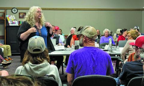 Tracy Fitzmaurice addresses the crowd at Albert Carlton Cashiers Library during a Fontana Regional Library  board of trustees meeting on Tuesday night.