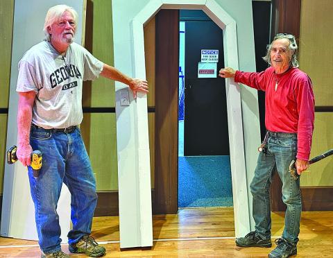 Matthew Eberz and Ricky Siegel work on sets for the upcoming run of the play “Social Security” staged by the Highlands Cashiers Players.