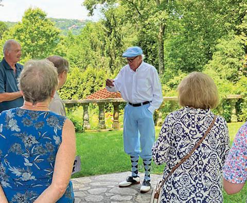 The ghost of Henry Sloan, portrayed by Harry McDonald, welcomes guests on the tour.