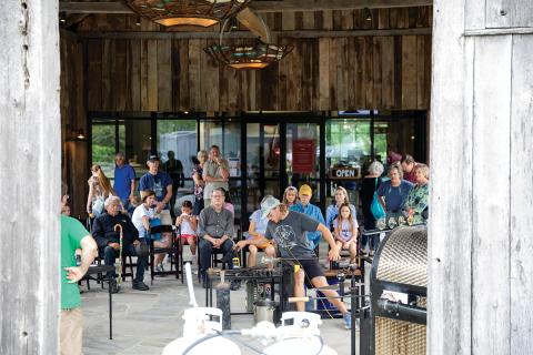 A glass blowing demonstration with the Green Energy Park during Community Day 2024.