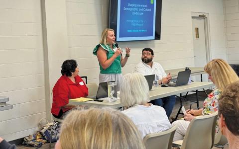Faviola Olvera, Leonal Gonzales and Leslie Manning lead a discussion on the complexities of immigration.