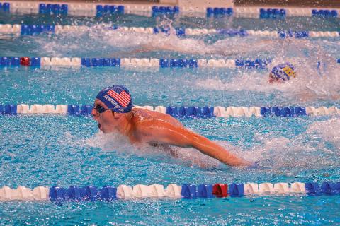 Conner Hughes in action against the Jackson County Swim Team.