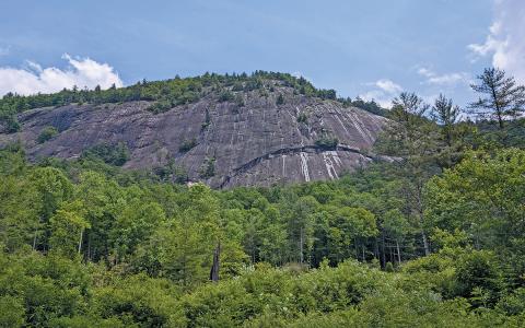 The new addition to the conserved area begins at the base of Rock Mountain.