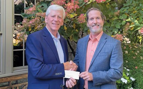 Highlands Country Club member and Bob Jones Invitational co-chair Ed Crenshaw and Health Foundation Executive Director Myrle Grate.