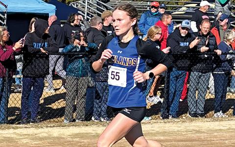 Claire Worley of Highlands runs to a 13th place finish at the NCHSAA 1A Championship.