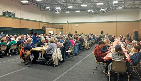Guests enjoy a variety of food at the Highlands Community Thanksgiving Dinner at the Highlands Rec Park on Tuesday, Nov. 25.