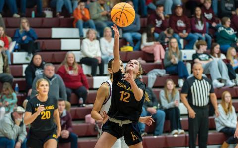 Junior Jordyn Borino attempts a crucial layup in a road matchup.  |  Photo courtesy of Todd Sumner.