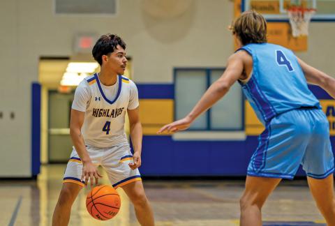 Sophomore Jayven Alvarado looks to make a move against a Towns County defender during Highlands’ 63-33 loss  |  Photo by Todd Sumner 