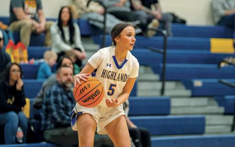 AE Woods scans the perimeter for an open pass in the Lady Highlanders’ 56-14 win over Nantahala on Friday, Jan. 16.  |  Photo courtesy of Todd Sumner