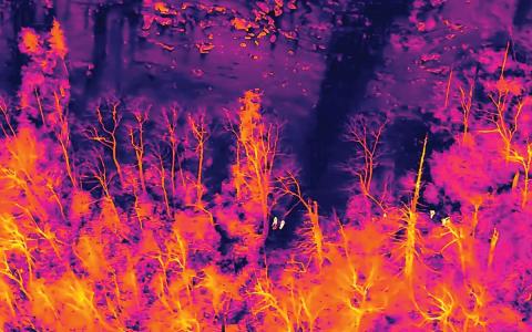 Glenville-Cashiers Rescue Squad used thermal imaging to locate the two climbers, which can be seen as the bright figures positioned on the dark, cold strip of ice.  |  Photo by Glenville-Cashiers Rescue Squad
