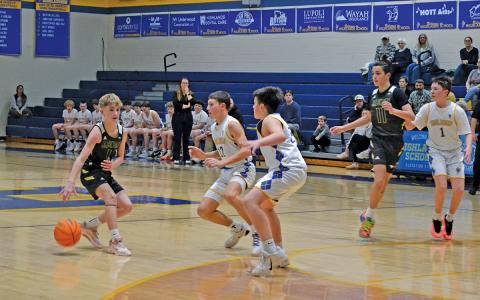 Peyton Sawyer takes a step back in front of Highlands defenders Todd Vilardo and Knox Holbrooks in Rabun Gap’s semi-final victory in the Tri-State Tournament.  |  Photo courtesy of Teresa Holbrooks