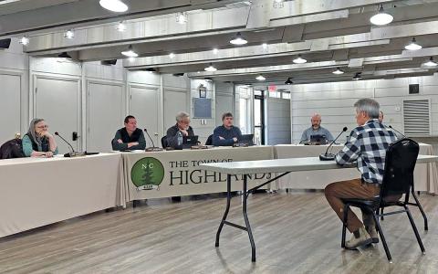 The Town of Highlands Board of Commissioners interviews Bill Grubb during the March 12 special meeting, asking questions about the Unified Development Ordinance and his vision for a multigenerational strategy.