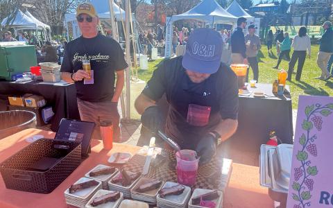 Robert Owens of Owens & Co. prepares his signature St. Louis spare ribs at the 2025 Highlands Food and Wine Festival.  |  Photo by Josh Bryson/Staff