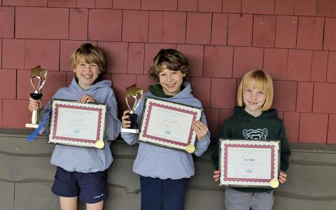 Summit Charter 3rd graders Patrick Hurley, Ryland Hurley and Demi Rindom show their awards from the annual Jackson Soil and Water Conservation District contest.  |  Photo courtesy of Jackson Soil and Water Conservation