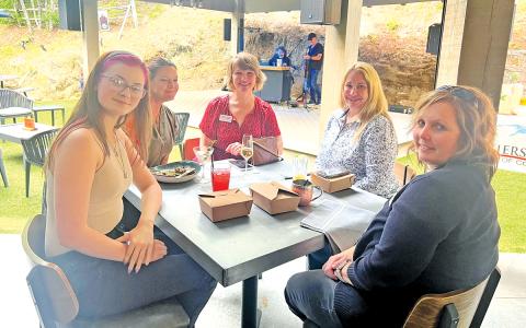 From left: Caitlyn Muniz, Lota Womack, Andrea Hamilton, Susan Sapienza and Heather Dalton enjoy food, drinks and live music at Happ’s Place during the 2025 Cashiers Burger Week Wrap Up Party.  |  Photo by Cashiers Area Chamber of Commerce