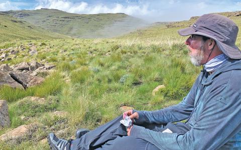 de Graffenried takes a break to catch a view on a hike to Tugela Falls in Royal Natal National Park, KwaZulu-Natal, South Africa on Dec. 24, 2024.  |  Photo courtesy of Jeff de Graffenried
