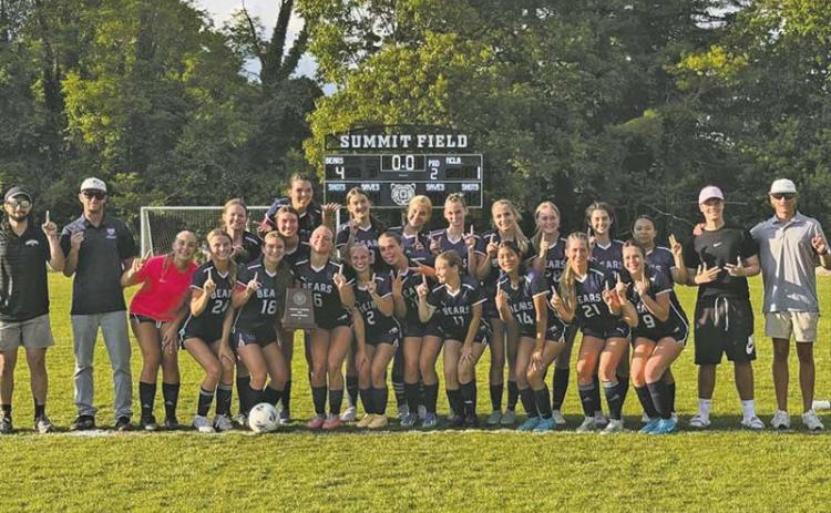 Photo courtesy of Summit Charter School - Summit Charter coaches and players celebrate following their historic victory over 19-win TNCLA in the state playoff semifinals.