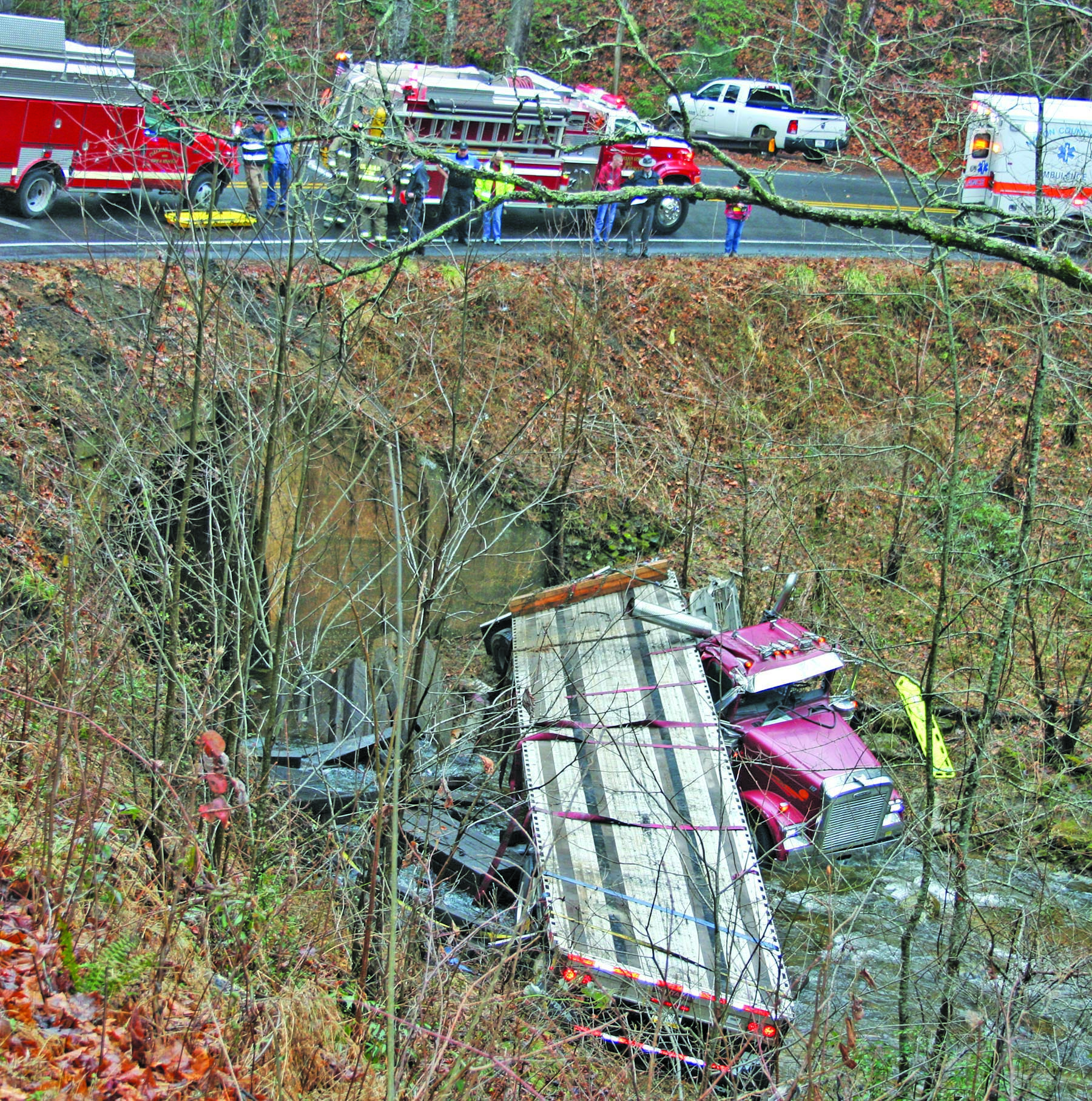File Photo Back in 2019, a tractor trailer damaged the shoulder of US64 and the embankment when it rolled down the hill on U.S. 64.