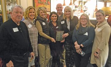 Highlands Chamber of Commerce board chair Hillary Wilkes presented the Robert B. Dupree Community Service Award to representatives of the Highlands-Cashiers Health Foundation during the 2019 Chamber Awards Banquet.