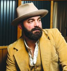 Drew Holcomb and the Neighbors were scheduled to headline the May 9 spring concert in Highlands.
