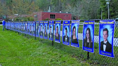 Highlands School seniors are being honored with a display along the track on 5th Street.