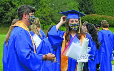 Face coverings were a requirement during the Highlands School graduation in August. The ceremony was held outside to accommodate social distancing due to the COVID-19 pandemic.