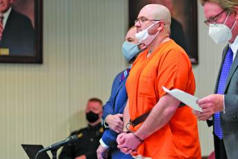 Thomas Glenn Palmer, 38, entered a guilty plea on Monday in Jackson County Superior Court and admitted to his role in killing his stepfather Tim Norris in Cashiers.