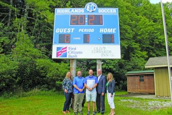 Photo by Christopher Smith/Staff First Citizens Bank and Old Edwards contributed $5,000 each for the new scoreboard. 