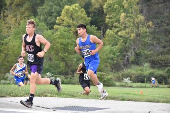 Photo by Kevin Hensley/ The Graham Star Jim De la Cruz placed 14 in the two-mile run.