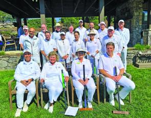 Submitted Photo Front row seated left to right, Michael Albert – First Vice-President/United States Croquet Association (Cedar Creek) Kathie Gamble – Chairman for 2022 GC National Tourn. (Trillium) Lynda Fuchs – Highlands Falls Venue Manager and Jochen Lucke – President of Silver Creek Realty, sponsor of GC National Tournament (CCSV and Cullasaja). Middle row seated left to right, Sherif Abdelwahab (Wildcat Cliffs) Don Eastman (Highlands Falls) Dawn Jupin (Chattooga) Barbara Jamison (Trillium) Ellen Nielson