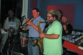 Photo by Christopher Lugo/Staff Rocksteady@8 at one of their concerts at The High Dive in Highlands last year. 