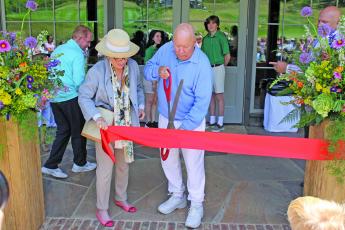 Photo by Christopher Lugo/Staff Owner of Old Edwards Inn Resort and Spa, Art Williams and his wife, Angela cut the ribbon to GlenCove. 
