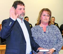 County commissioner John Shearl took his oath of office on Monday night.