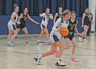 Photo by Michael O’Hearn/Staff - Highlands stifled Summit during their girls basketball game with a stingy pressure defense that forced several turnovers and led to easy baskets in transition.