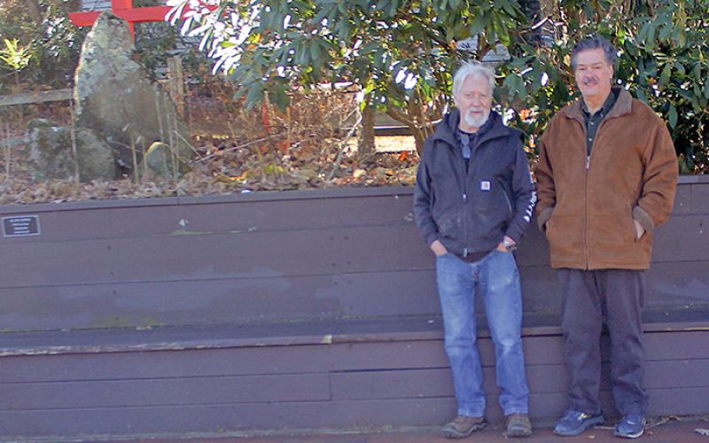 The Loafer’s Bench outside of the former Stone Lantern property still serves as a popular resting place for visitors to Highlands, even after the business closed its doors earlier this year. Ralph deVille, Jim Bud Rogers (left) and Mike Thompson (right) built the bench more than 40 years ago.