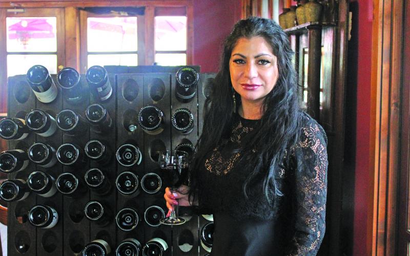 Kiki Donikian, owner of Midpoint Highlands on Main Street, has built a successful restaurant through hard work and perseverance.
