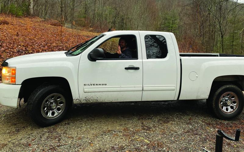 Highlands-Cashiers Land Trust stewardship coordinator Kyle Pursel heads to work in a new Chevrolet pickup provided by Dimmitt Chevrolet.