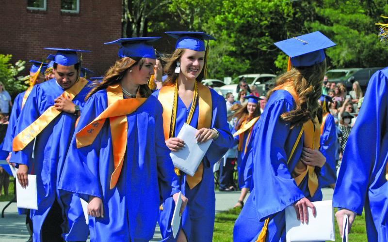 Members of Highlands School’s Class of 2021 entered via the track for commencement on Saturday morning.