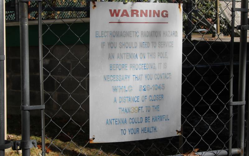 A sign posted on the fence outside the Big Bear Pen communication tower. 