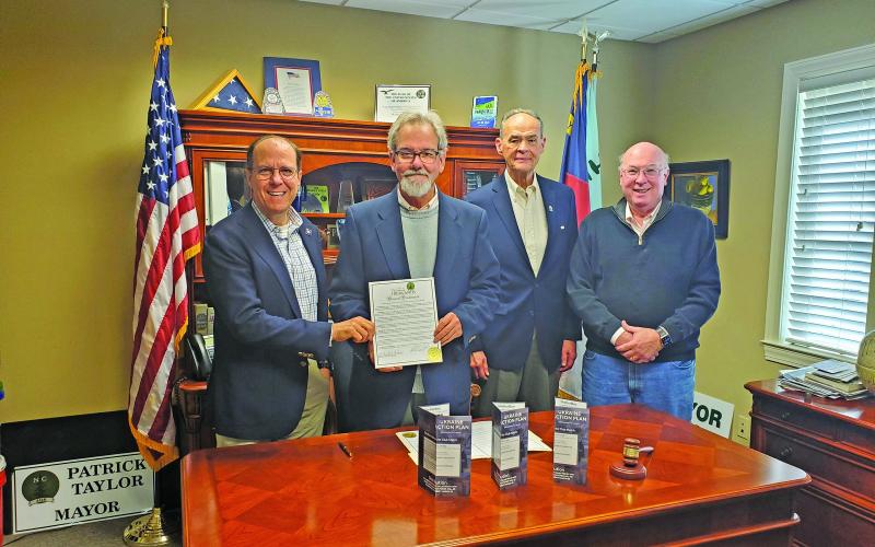 Submitted Photo Pictured are Kirk Dornbush, Past  President, Mountaintop Rotary Club of Highlands, Highlands Mayor Patrick Taylor, Michael Vavrek, President, Mountaintop Rotary Club of Highlands and Andy Walker, Secretary Elect, Mountaintop Rotary Club of Highlands.